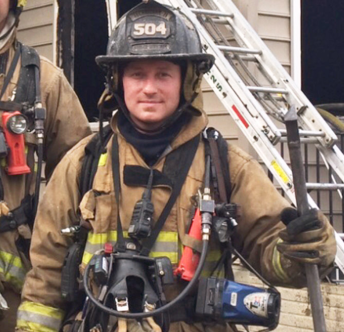 Mike Mishler in full fire and rescue gear