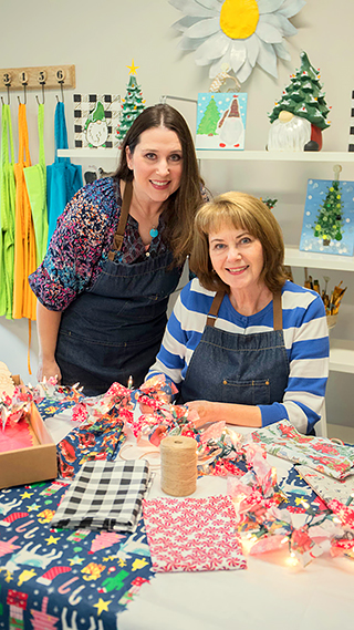 Brenda Fristoe (seated) and her daughter Staci at their business