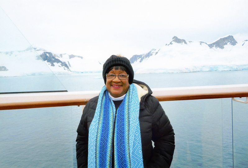portrait of Ruby Osia on a ship in Paradise Bay, Antarctica